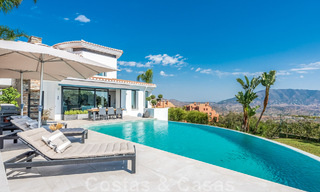 Detached, Andalusian villa for sale with panoramic mountain and sea views in an exclusive urbanisation in East Marbella 47373 