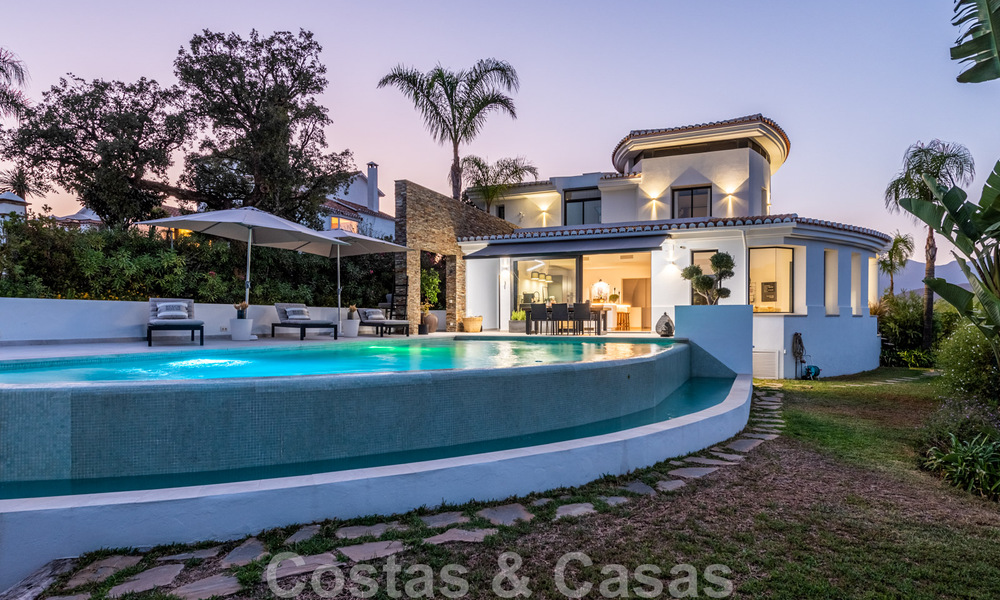 Detached, Andalusian villa for sale with panoramic mountain and sea views in an exclusive urbanisation in East Marbella 47375