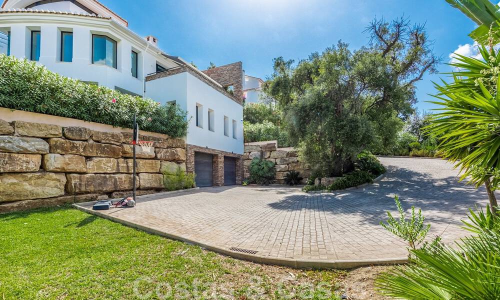 Detached, Andalusian villa for sale with panoramic mountain and sea views in an exclusive urbanisation in East Marbella 47388
