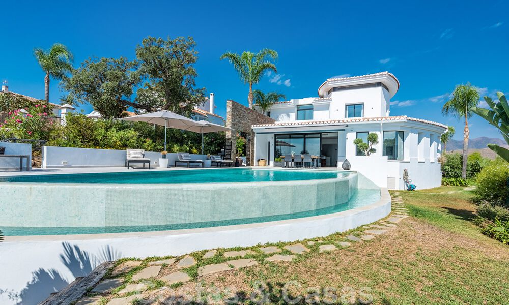 Detached, Andalusian villa for sale with panoramic mountain and sea views in an exclusive urbanisation in East Marbella 47390