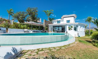Detached, Andalusian villa for sale with panoramic mountain and sea views in an exclusive urbanisation in East Marbella 47390 