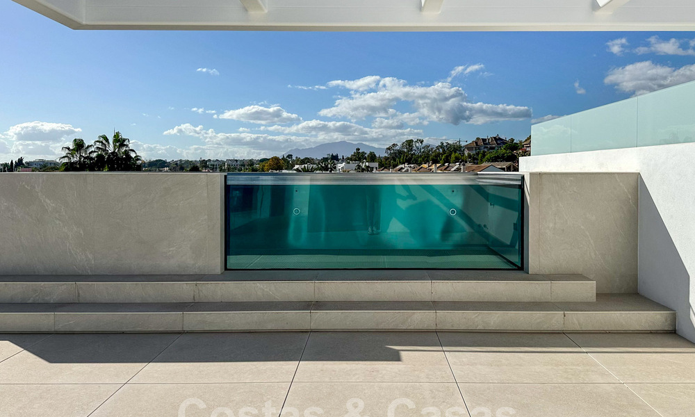 Ready to move in, exclusive high-end semi-detached villa for sale within walking distance of Puerto Banus in Nueva Andalucia, Marbella 61006