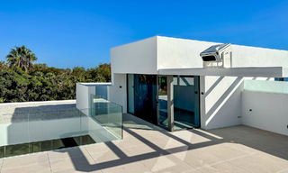 Ready to move in, exclusive high-end semi-detached villa for sale within walking distance of Puerto Banus in Nueva Andalucia, Marbella 61007 