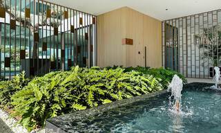 Ready to move in, exclusive high-end semi-detached villa for sale within walking distance of Puerto Banus in Nueva Andalucia, Marbella 61033 
