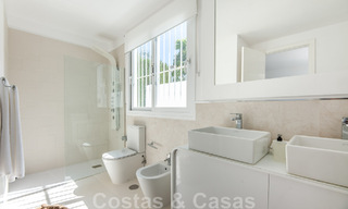 Detached Mediterranean villa for sale within walking distance of amenities overlooking the golf valley and mountain scenery in Nueva Andalucia, Marbella 47548 