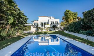 Detached Mediterranean villa for sale within walking distance of amenities overlooking the golf valley and mountain scenery in Nueva Andalucia, Marbella 47550 