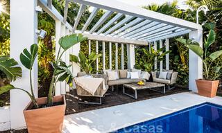 Detached Mediterranean villa for sale within walking distance of amenities overlooking the golf valley and mountain scenery in Nueva Andalucia, Marbella 47551 