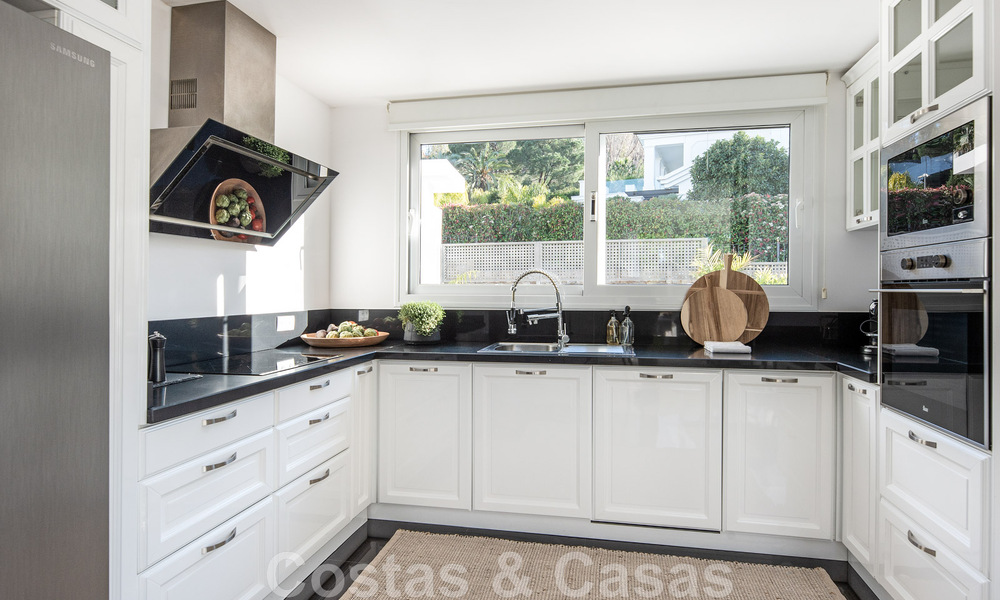 Detached Mediterranean villa for sale within walking distance of amenities overlooking the golf valley and mountain scenery in Nueva Andalucia, Marbella 47553