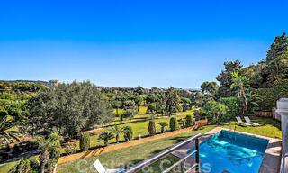 Andalusian luxury villa for sale adjacent to golf course, with sea views, in highly sought-after location in East Marbella 48322 