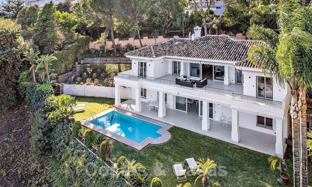 Andalusian luxury villa for sale adjacent to golf course, with sea views, in highly sought-after location in East Marbella 48333