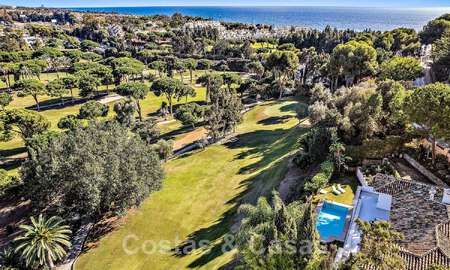 Andalusian luxury villa for sale adjacent to golf course, with sea views, in highly sought-after location in East Marbella 48334