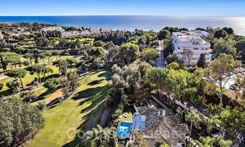 Andalusian luxury villa for sale adjacent to golf course, with sea views, in highly sought-after location in East Marbella 48336
