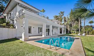 Andalusian luxury villa for sale adjacent to golf course, with sea views, in highly sought-after location in East Marbella 48340 