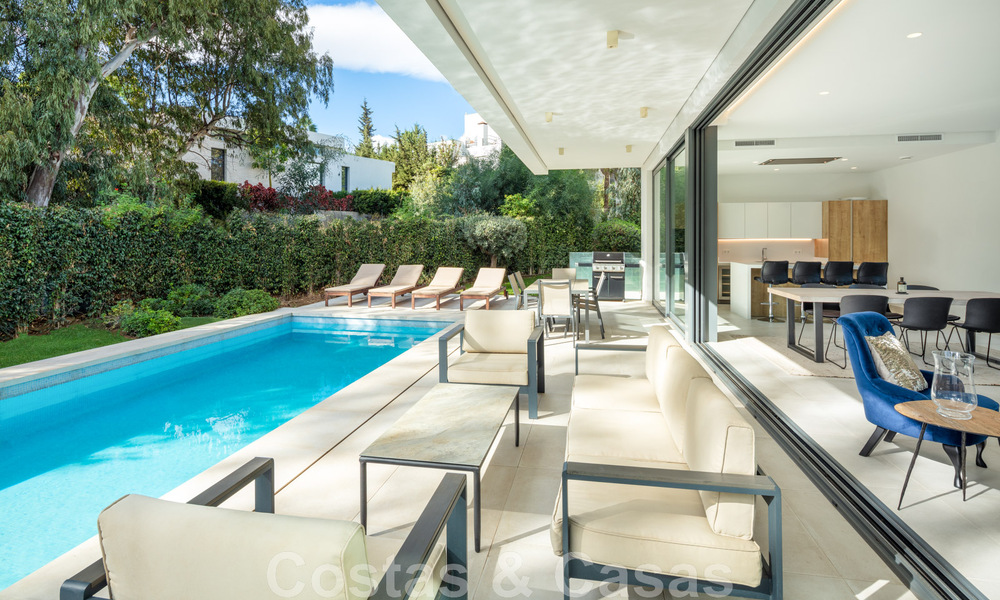 Detached boutique villa for sale surrounded by greenery in a private gated community on the New Golden Mile between Marbella and Estepona 47831