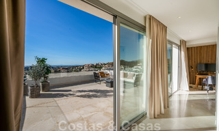 Move-in ready, modern penthouse for sale with open sea views in a modern complex in Nueva Andalucia, Marbella 47893 