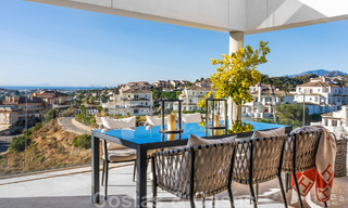 Move-in ready, modern penthouse for sale with open sea views in a modern complex in Nueva Andalucia, Marbella 47908 