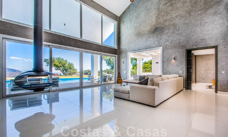 Detached villa for sale designed with modern architecture on a high position with panoramic mountain and sea views, in an exclusive urbanisation in East Marbella 47987