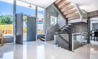 Detached villa for sale designed with modern architecture on a high position with panoramic mountain and sea views, in an exclusive urbanisation in East Marbella 47997 