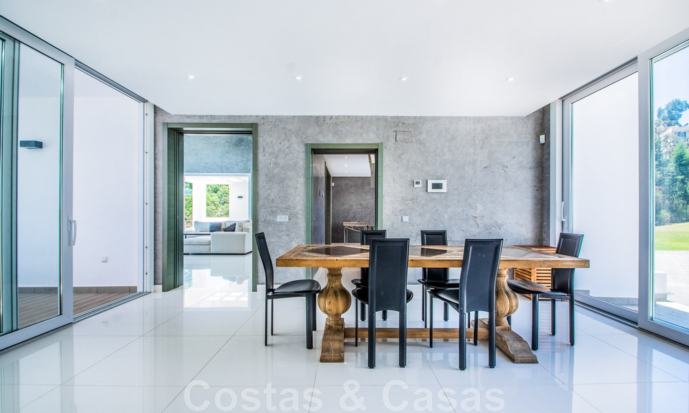 Detached villa for sale designed with modern architecture on a high position with panoramic mountain and sea views, in an exclusive urbanisation in East Marbella 48002