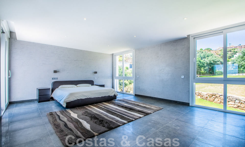 Detached villa for sale designed with modern architecture on a high position with panoramic mountain and sea views, in an exclusive urbanisation in East Marbella 48007