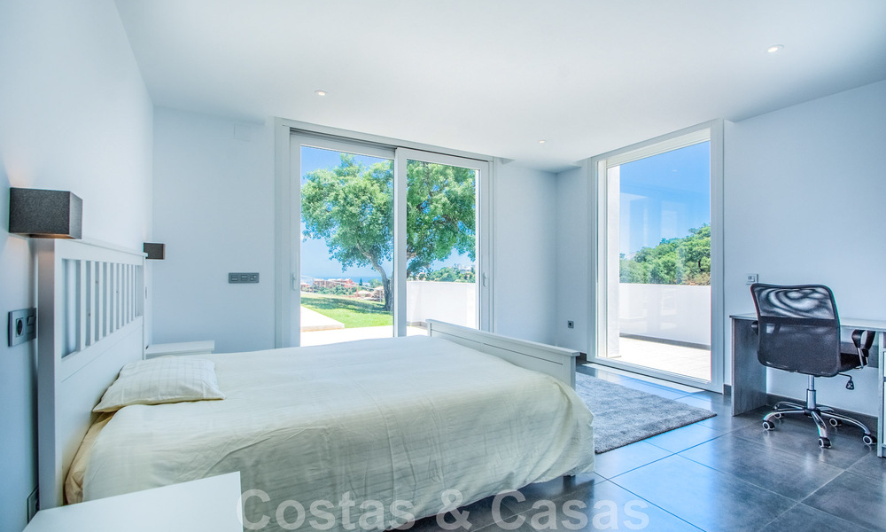 Detached villa for sale designed with modern architecture on a high position with panoramic mountain and sea views, in an exclusive urbanisation in East Marbella 48019