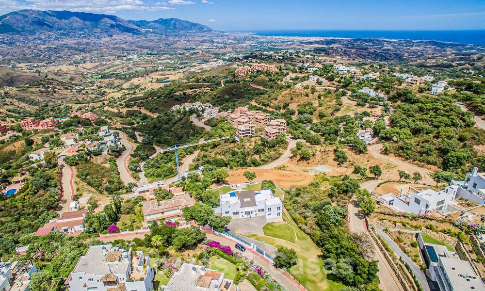 Detached villa for sale designed with modern architecture on a high position with panoramic mountain and sea views, in an exclusive urbanisation in East Marbella 48028