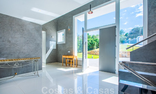 Detached villa for sale designed with modern architecture on a high position with panoramic mountain and sea views, in an exclusive urbanisation in East Marbella 48036 