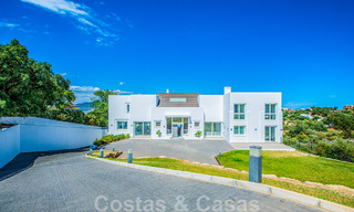 Detached villa for sale designed with modern architecture on a high position with panoramic mountain and sea views, in an exclusive urbanisation in East Marbella 48037 