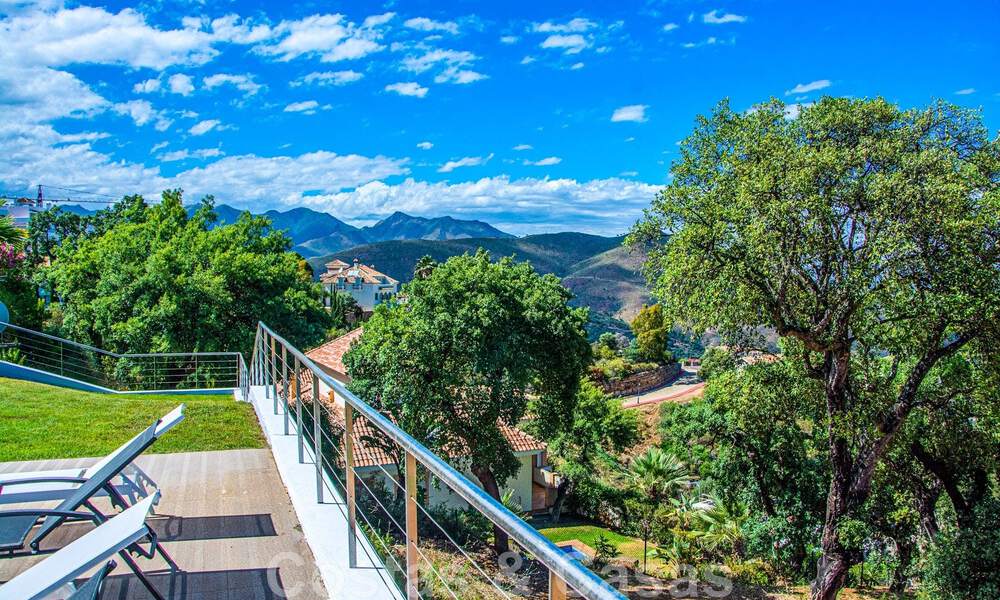 Detached villa for sale designed with modern architecture on a high position with panoramic mountain and sea views, in an exclusive urbanisation in East Marbella 48041