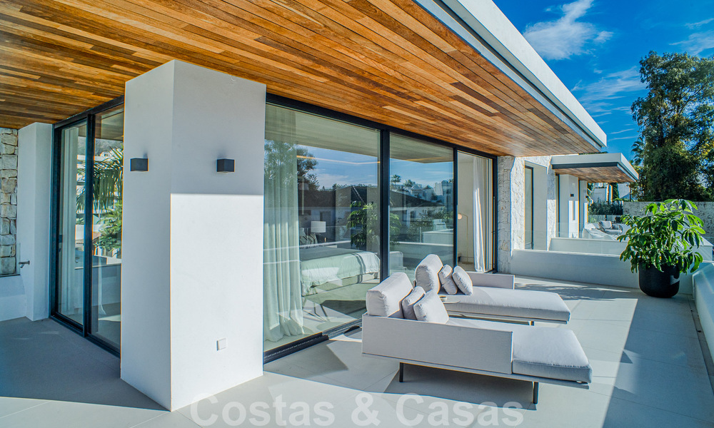 Contemporary new villa for sale with sea views, centrally located within walking distance to the beach on Marbella's Golden Mile 50071
