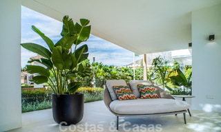 Contemporary new villa for sale with sea views, centrally located within walking distance to the beach on Marbella's Golden Mile 50080 