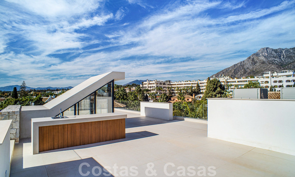 Contemporary new villa for sale with sea views, centrally located within walking distance to the beach on Marbella's Golden Mile 50092