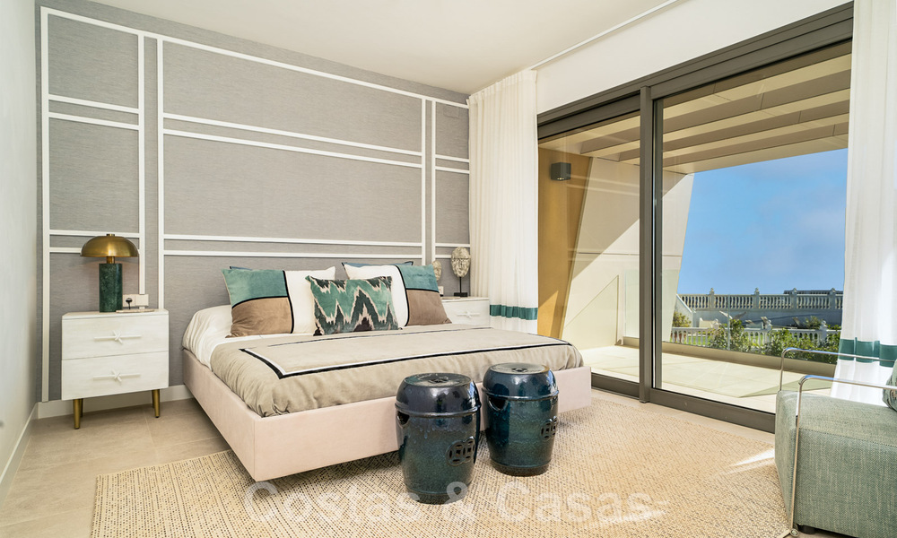 Superb show home for sale in a new development comprising semi-detached villas with sea views in a luxury resort Mijas, Costa del Sol 48571