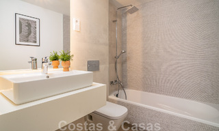 Superb show home for sale in a new development comprising semi-detached villas with sea views in a luxury resort Mijas, Costa del Sol 48583 