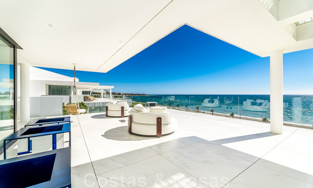 Move-in ready, modern, ultra-luxurious penthouse for sale, frontline beach, with open sea views, between Marbella and Estepona 48243