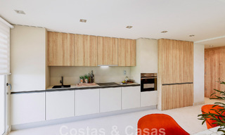 Modern golf apartments for sale situated in an exclusive golf resort in Mijas, Costa del Sol 49188 