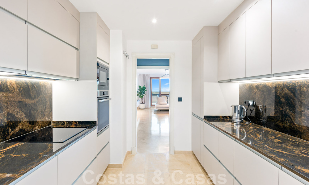 Modern refurbished apartment for sale, with sea views in gated complex on the New Golden Mile between Marbella and Estepona 49526