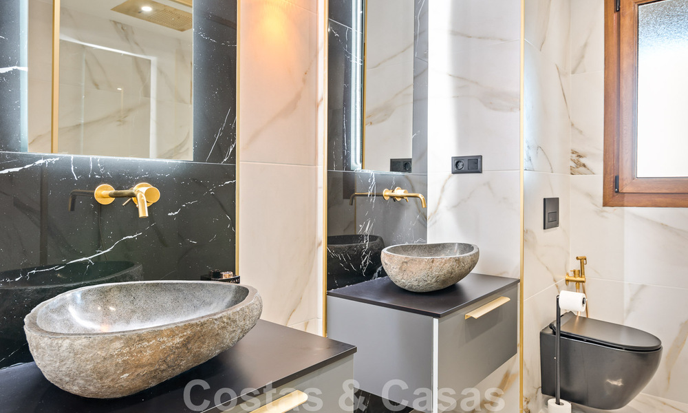 Modern refurbished apartment for sale, with sea views in gated complex on the New Golden Mile between Marbella and Estepona 49541