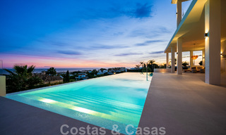 Exclusive designer villa with panoramic sea views for sale in the a five-star golf resort in Marbella - Benahavis 48824 