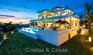 Exclusive designer villa with panoramic sea views for sale in the a five-star golf resort in Marbella - Benahavis 48837 
