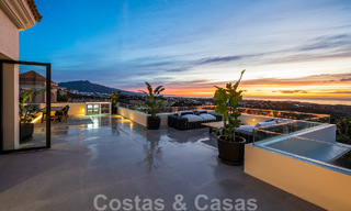 Exclusive designer villa with panoramic sea views for sale in the a five-star golf resort in Marbella - Benahavis 48839 