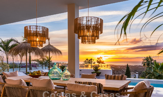 Exclusive designer villa with panoramic sea views for sale in the a five-star golf resort in Marbella - Benahavis 48841 