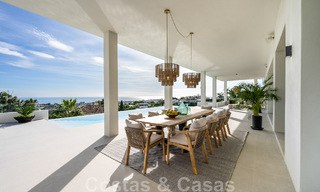Exclusive designer villa with panoramic sea views for sale in the a five-star golf resort in Marbella - Benahavis 48851 