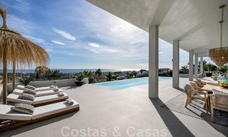 Exclusive designer villa with panoramic sea views for sale in the a five-star golf resort in Marbella - Benahavis 48853 