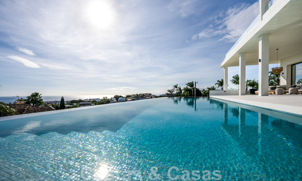 Exclusive designer villa with panoramic sea views for sale in the a five-star golf resort in Marbella - Benahavis 48854