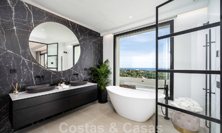 Exclusive designer villa with panoramic sea views for sale in the a five-star golf resort in Marbella - Benahavis 48883 