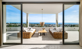 Exclusive designer villa with panoramic sea views for sale in the a five-star golf resort in Marbella - Benahavis 48887 