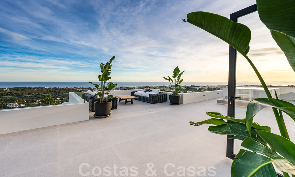 Exclusive designer villa with panoramic sea views for sale in the a five-star golf resort in Marbella - Benahavis 48893