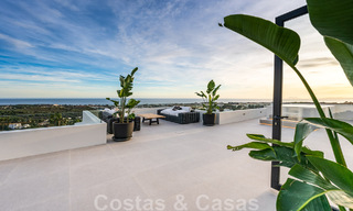 Exclusive designer villa with panoramic sea views for sale in the a five-star golf resort in Marbella - Benahavis 48893 