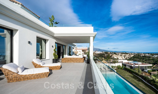 Exclusive designer villa with panoramic sea views for sale in the a five-star golf resort in Marbella - Benahavis 48898 